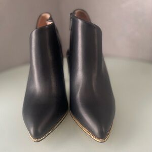 BCBGeneration Black Ankle Booties with Gold Accents